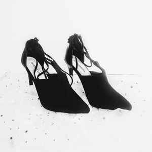JUSTFABOLOUS HELL SHOES.SIZE 7 COLOR BLACK